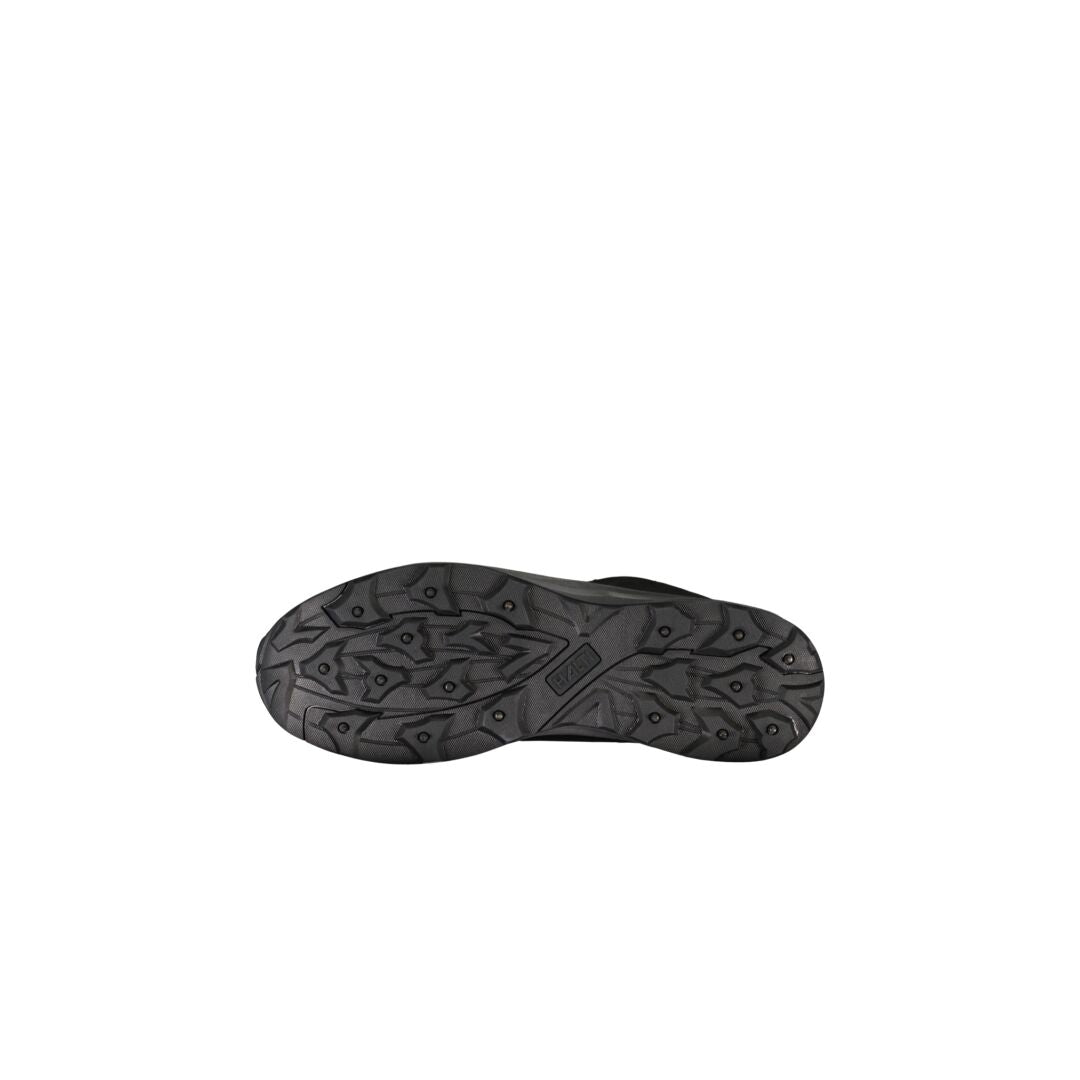 Halti Kenai Mid Miesten DrymaxX Nastakengän musta pohja ja nastapohjakuvio alhaalta valkoisella taustalla.