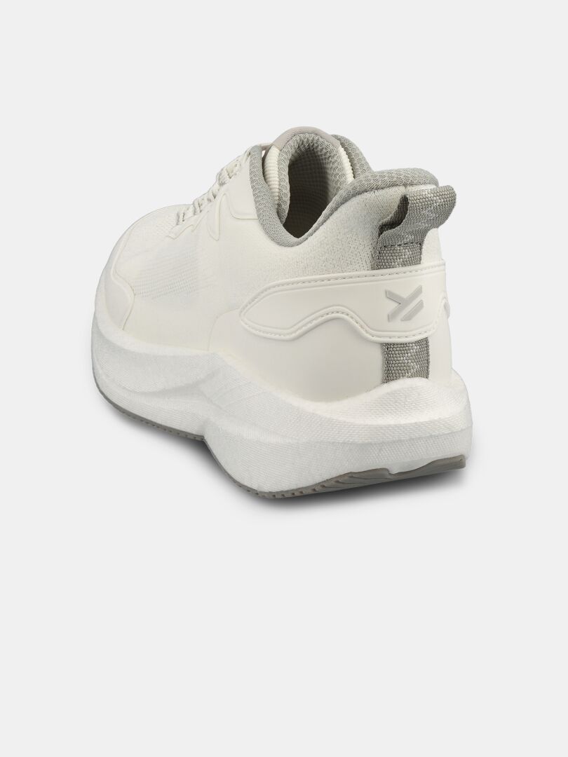 Halti Syke Lenkkari Miesten on valkoinen miesten lenkkari, jossa on harmaa sisusta, kuvattuna takaa valkoisella pohjalla.