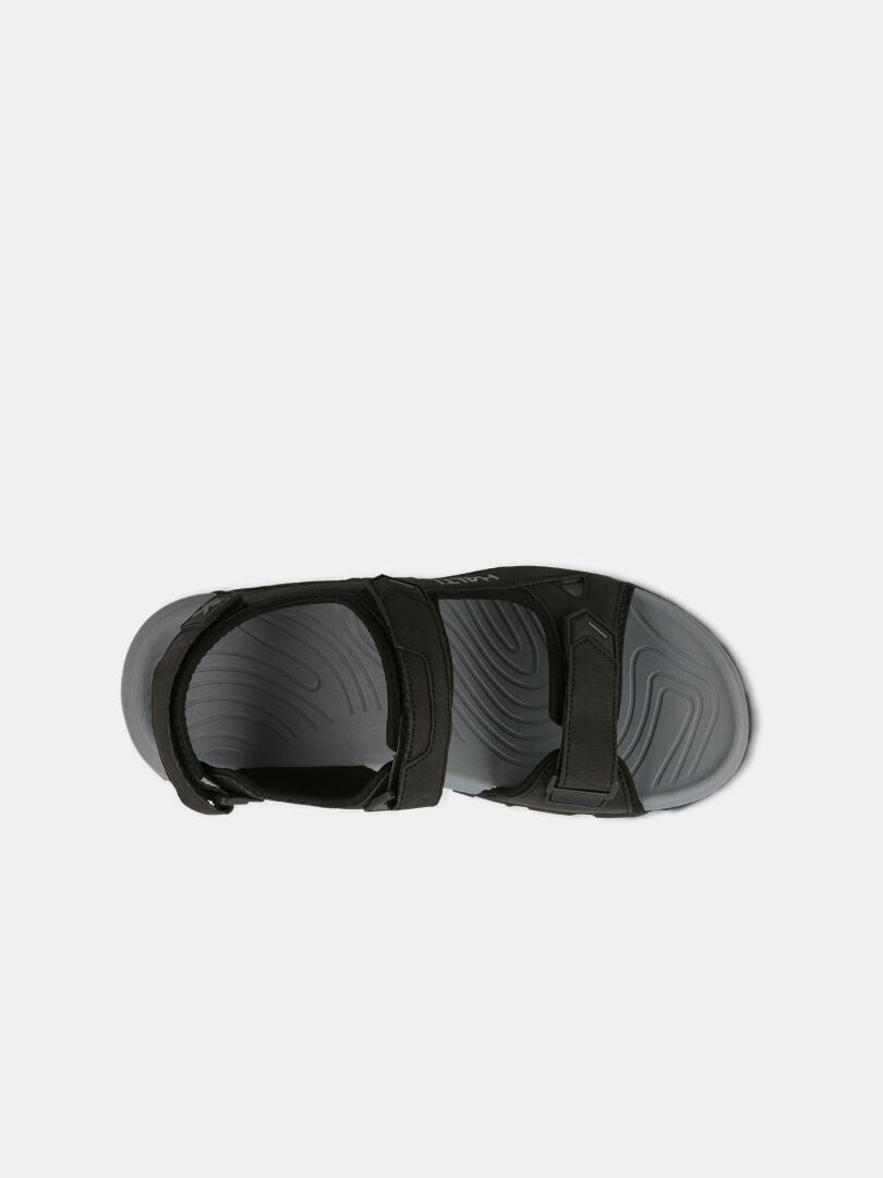 Halti Route 2 Sandaali: musta avokärkisandaali, jossa on 2 säädettävää remmiä ja ergonominen pohja, ylhäältä katsottuna.