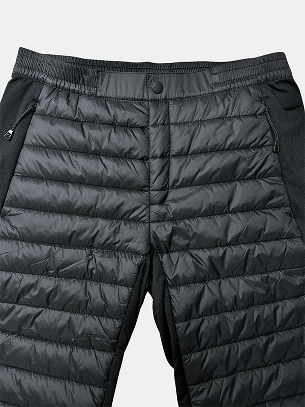 Lähikuva Halti Veidnes Kevyesti Topatut Housut Naisten, jossa on vetoketjutaskut, joustava vyötärö ja nepparikiinnitys.