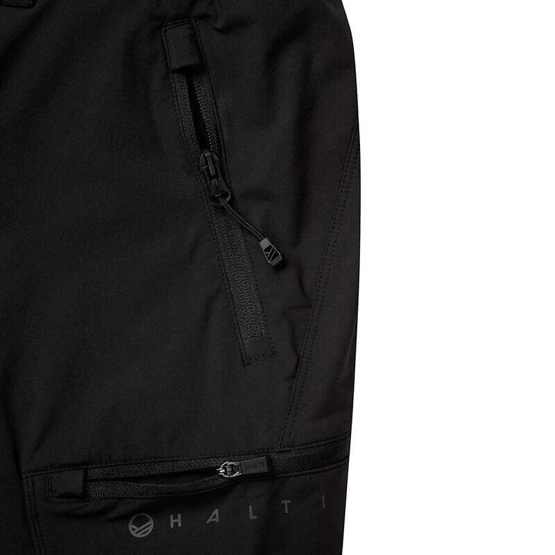 Lähikuva Halti Pallas Evo Long X-stretch -housuista naisille vetoketjullisilla taskuilla – täydelliset ulkoiluun.