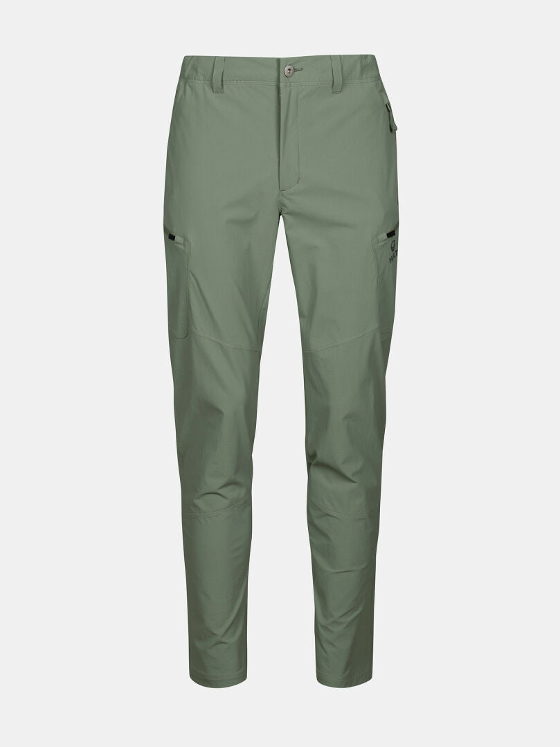 Vaaleanvihreät Halti Pallas Evo X-stretch miesten housut nappikiinnityksellä, vetoketjusepaluksella ja sivutaskuilla valkoisella pohjalla.