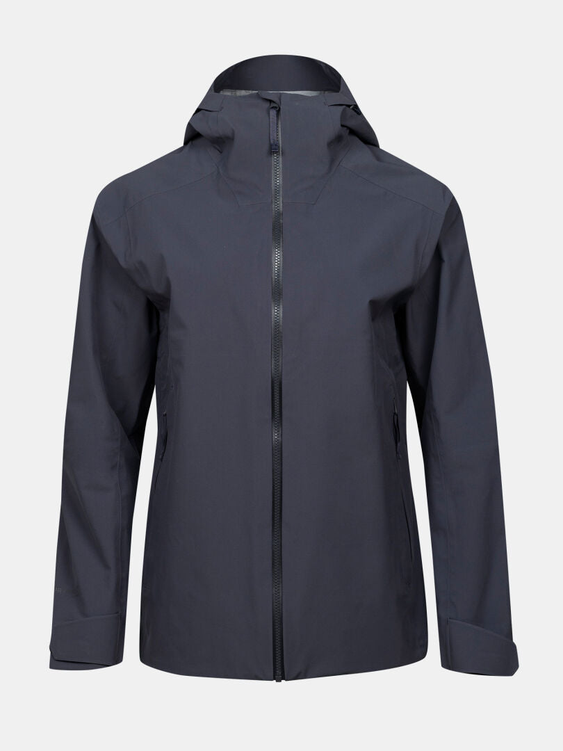 Halti Kajana 3L DX Kuoritakki Naisten on tummanharmaa vedenpitävä takki DrymaxX-kalvolla, etuvetoketjulla ja kahdella sivutaskulla.