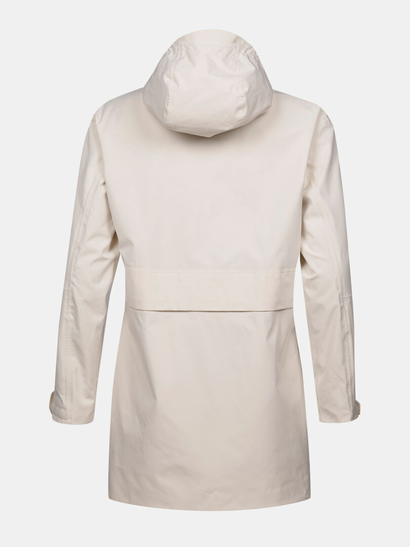 Halti Kallas DX Parkatakki Naisten takaa katsottuna, vaaleanbeigen värinen vedenpitävä takki DrymaxX®-kalvolla ja minimalistisilla yksityiskohdilla.