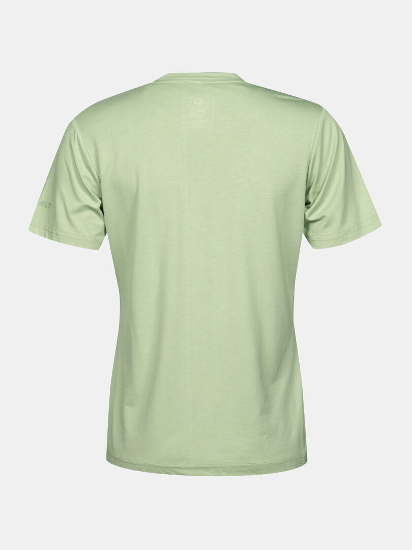 Vaaleanvihreä Halti Kalteva T-paita Naisten selästä kuvattuna yksinkertaista valkoista taustaa vasten.