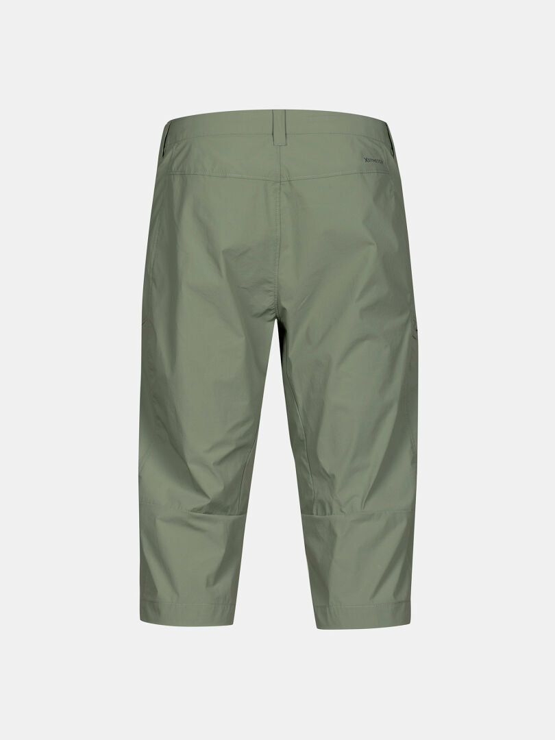 Halti Pallas Cool X-stretch Miesten Caprit -takki, vaaleanvihreä ja polvipituinen, selän näkymä valkoista taustaa vasten.