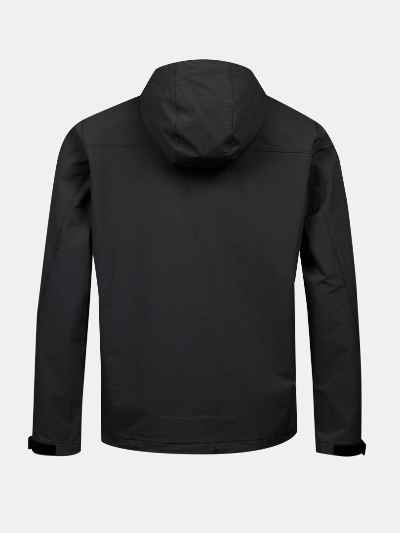 Halti Finholma X-stretch Takki Miesten takakuva, musta, pitkät hihat, säädettävät hihansuut, yksivärisellä pohjalla.