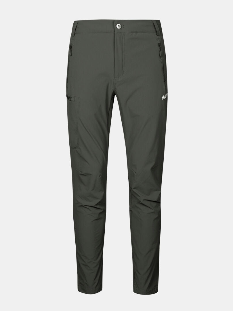 Halti Pallas X-stretch Ulkoiluhousut Miesten: tummanvihreä, slim-fit, vetoketjulliset taskut, hengittävä X-stretch Active -kangas.