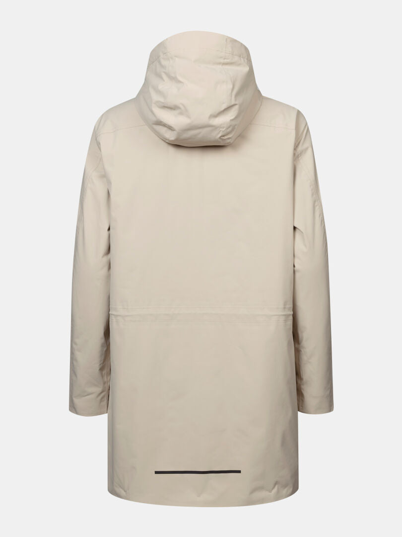 Halti Kortteli DX -parka naisille: beige, hupullinen, kuvassa takanäkymä valkoisella taustalla, ei näkyviä logoja tai koristeita.