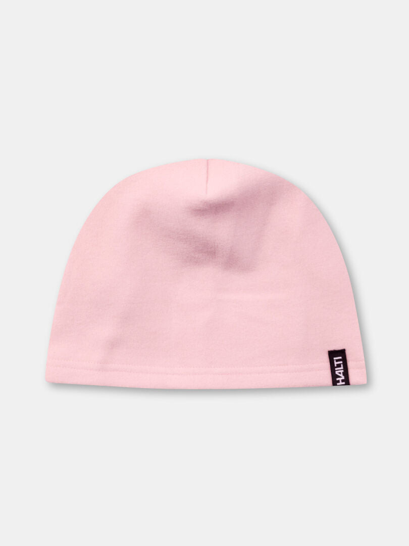 Halti Trone Fleecepipo on vaaleanpunainen pipo, jossa on mustavalkoinen lappu ja joka sopii erinomaisesti juoksuun.