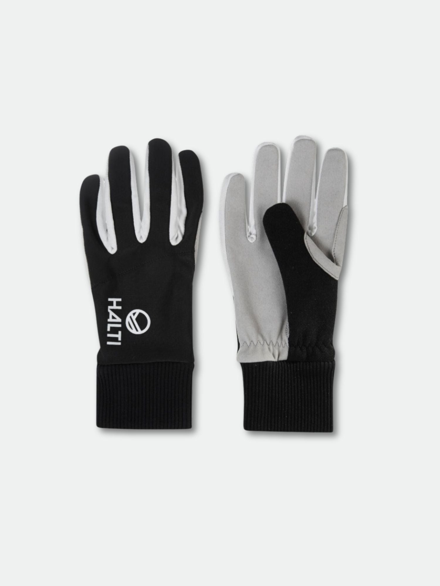 Halti XC Touring Maastohiihtohanskat: yksi musta HAITI-tekstillä, yksi harmaa, molemmissa kylkihihansikkaat ja tuulenpitävä materiaali.