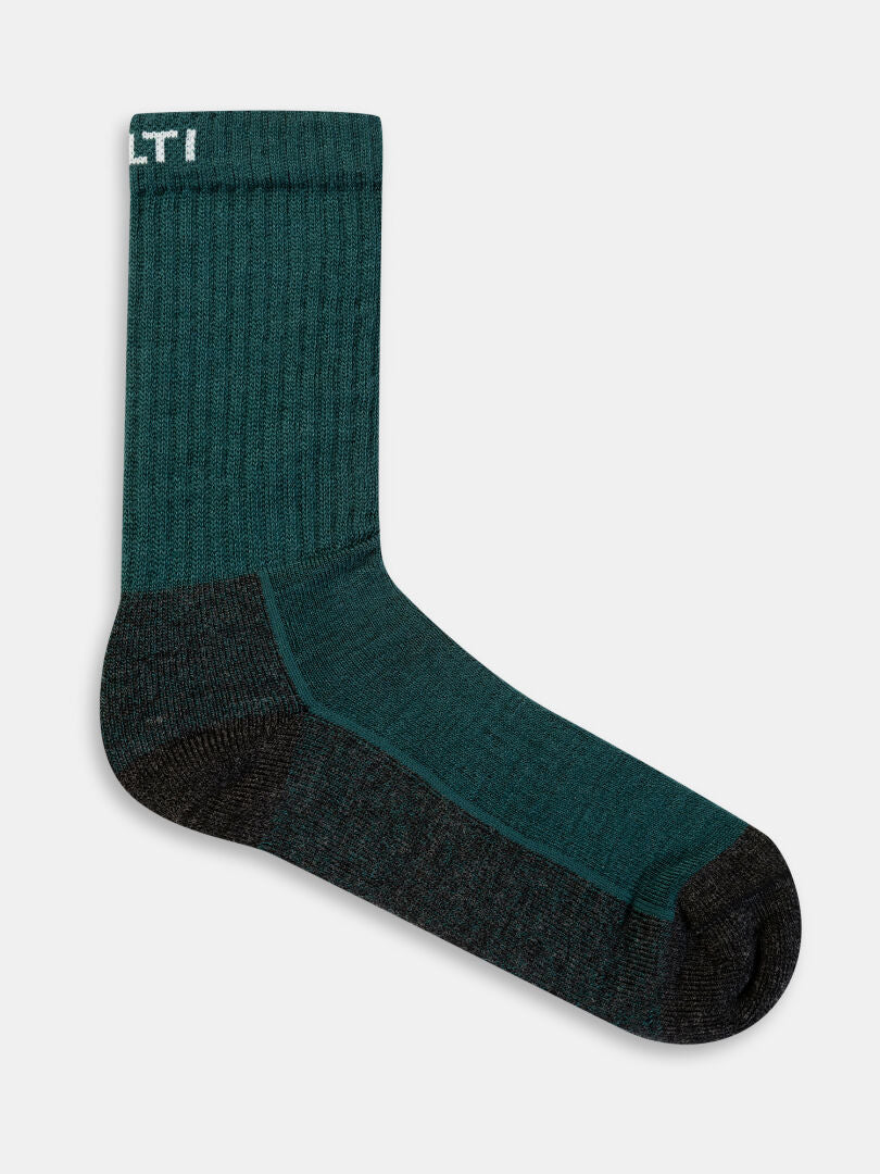 Halti Lämpimät Merinosukat -sukat, väri teal, musta kantapää, kärki ja pohja, kuvattu sivulta.