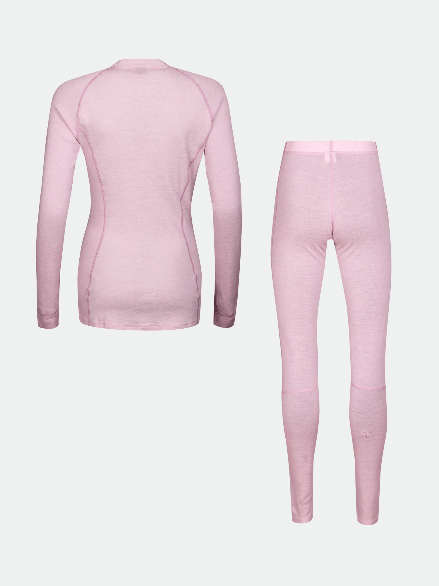 Halti Hossa Merinovillakerrasto Naisten vaaleanpunainen lämpöpaita ja legginsit setti esillä yksivärisellä pohjalla.