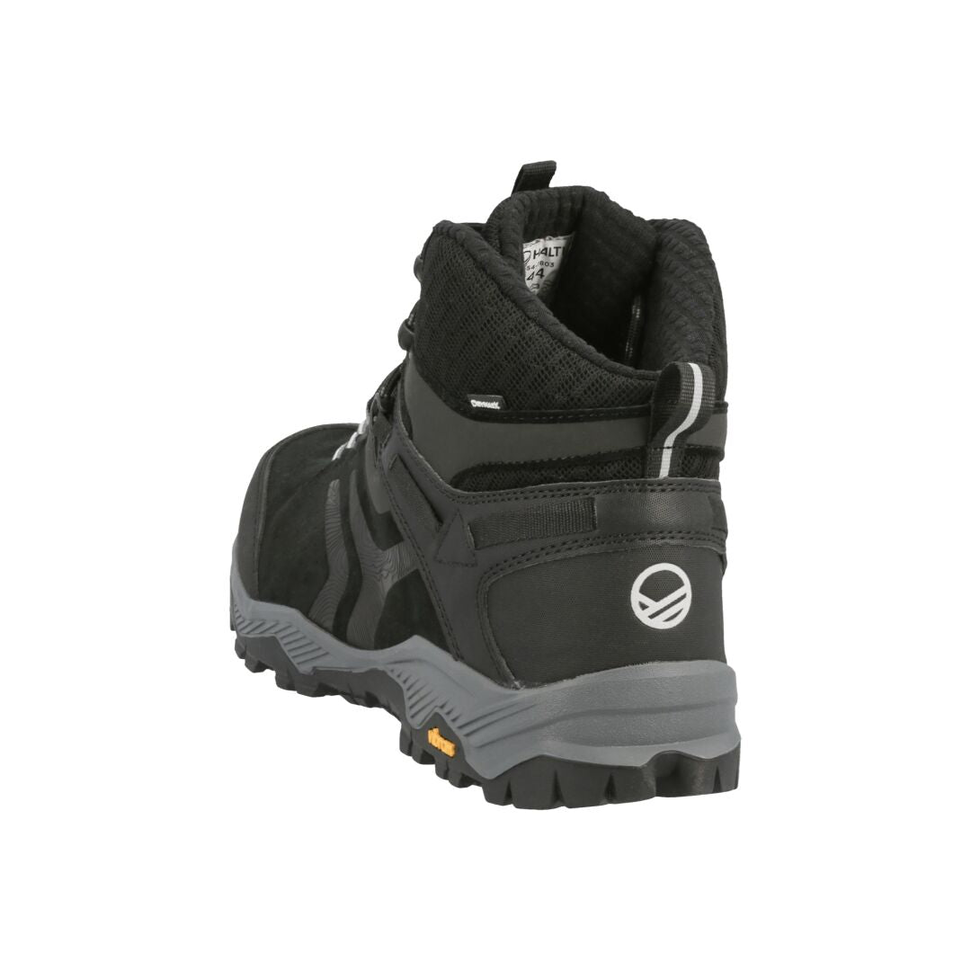 Kuvassa on musta/harmaa Halti Ragnar Mid DrymaxX -vaelluskenkä, jossa on Vibram-pohja ja takapuoli valkoisella taustalla.