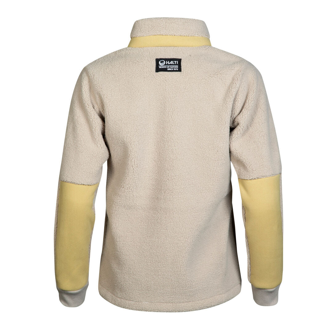 Selkänäkymä Halti Hiker Naisten Polar Fleecetakki -takista beigenvärisenä, keltaisilla hihoilla, kauluksella ja mustalla kaulamerkillä.