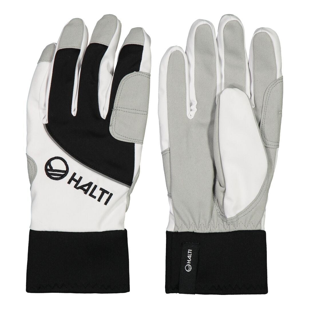 Halti Kide Maastohiihtohanskat -käsineet, kuvassa molemmin puolin, sopivat erinomaisesti aktiiviseen talviurheiluun.