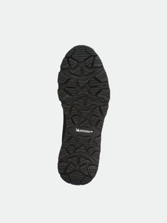 Halti Buli Low 2 DX Freelock -kengän mustassa pohjassa on Michelin kitkapohjainen kulutuspinta ja valkoinen Michelin-logo yksivärisellä pohjalla.
