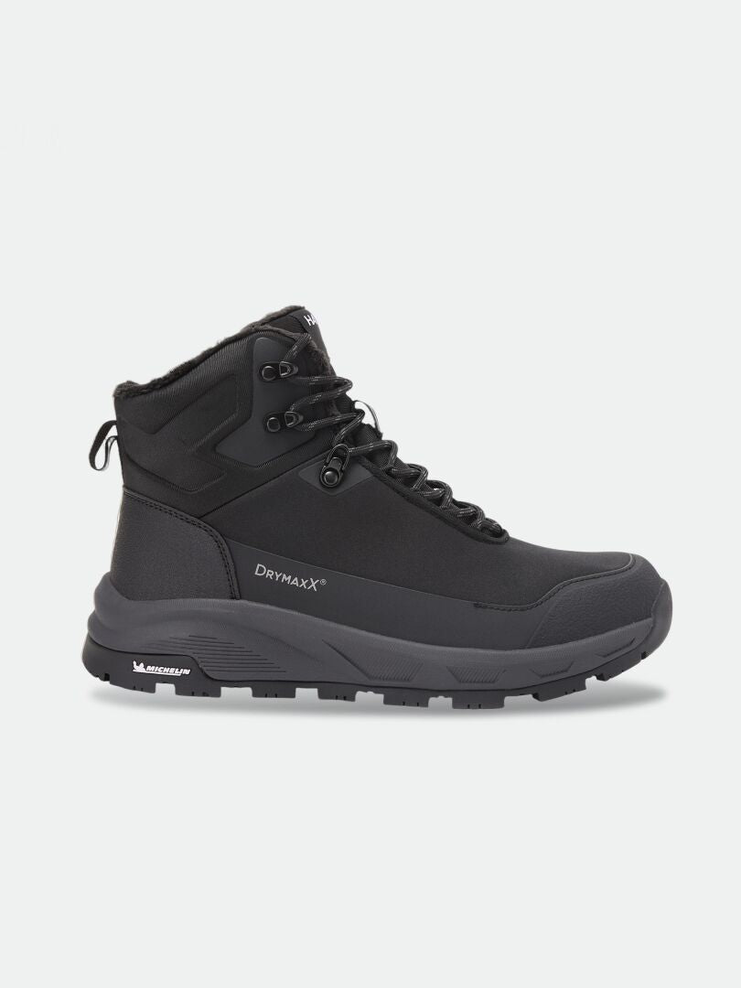 Black Tunturi Mid DX IC Talvikenkä – puolikorkea talvikenkä, jossa on kuvioitu Michelin Ice Grip -kumipohja ja nauhakiristys.
