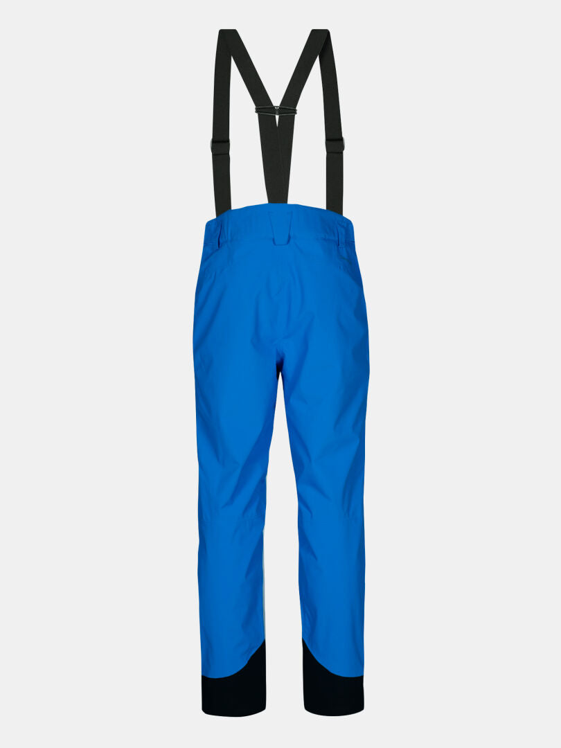 Halti Carvey II DX miesten lasketteluhousut, kirkkaansininen, mustat henkselit ja DrymaxX-housunlahkeet.