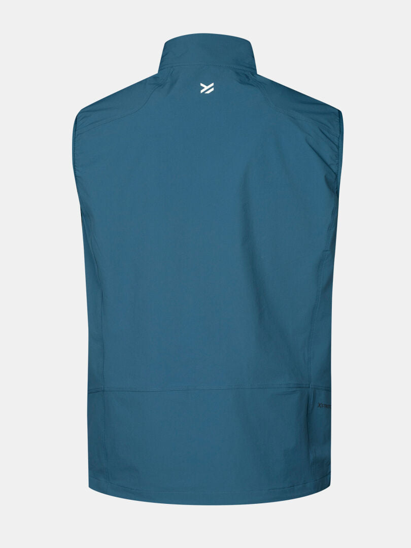 Halti Pallas Evo X-stretch Liivi Miesten sininen, hihaton, valkoisella kauluksen logolla ja vetoketjullisella sivutaskulla.