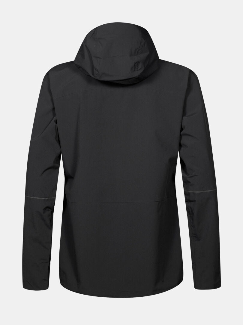 Halti Staala DX Kuoritakki Naisten Plus mustana takaapäin vaaleanharmaata taustaa vasten.