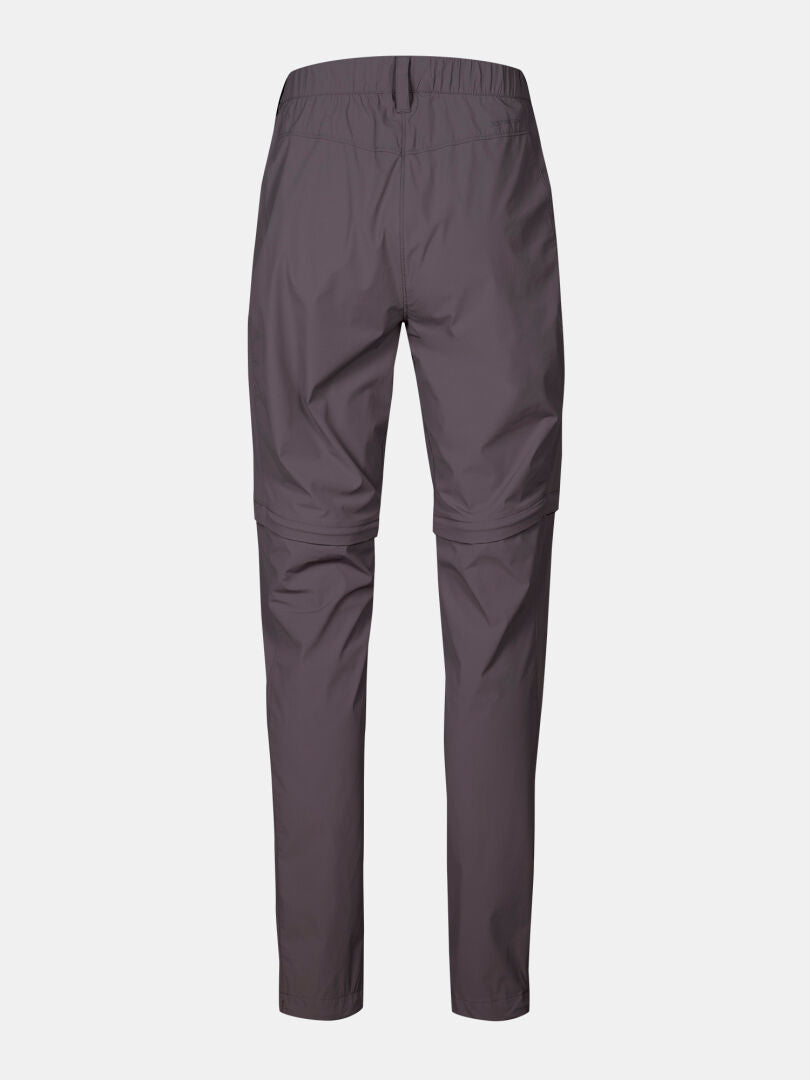 Halti Pallas Cool Stretch Zip-off Housut Naisten takakuva, jossa on joustava vyötärönauha ja polven vetoketjut valkoisella pohjalla.