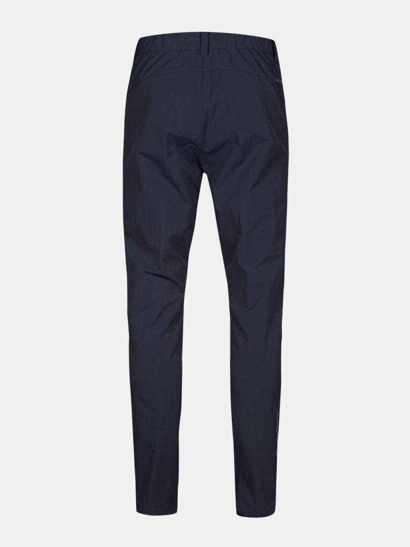 Halti Finholma X-stretch Housut Miesten, tummansiniset, suoralahkeiset housut selästä kuvattuna joustavasta X-stretch-materiaalista.