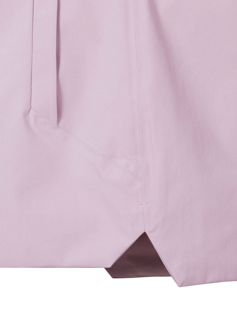 Lähikuvassa Valaja DX Parkatakki Naisten Plus by Halti, jossa on vaaleanpunainen DrymaxX Cottony -kangas ja geometrinen sauma.