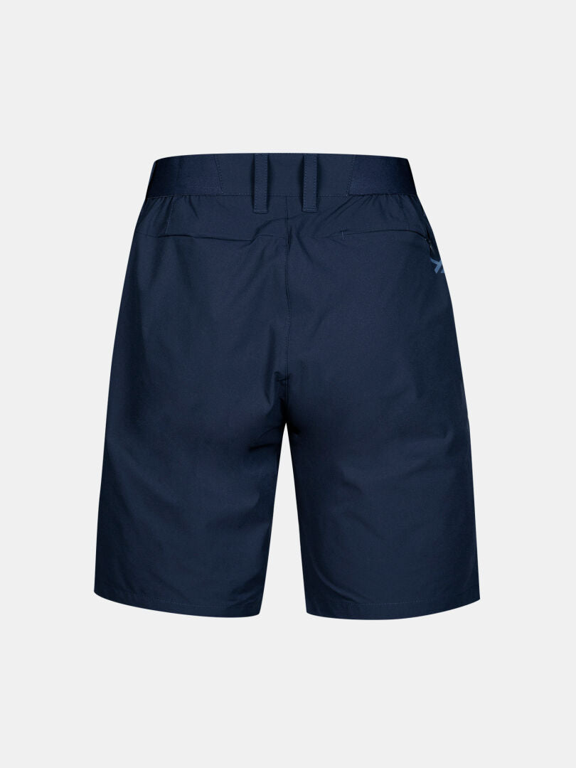Drive X-stretch Shortsit Naisten by Halti tummansinisessä värissä, kuvassa selkäpuolelta, vyölenkit ja kaksi takataskua.