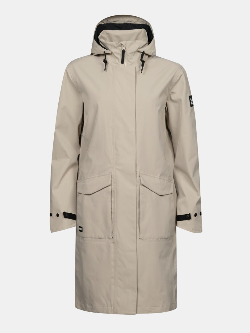 Halti Tokoi II DX -retkeilytakki naisille: beige, vedenpitävä hupullinen takki, jossa on säädettävät hihat ja taskut.