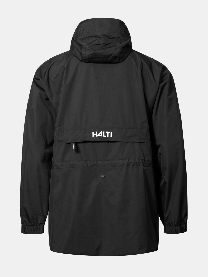 Musta Halti Coach Takki by Halti, jossa on vetoketjullinen tasku ja selässä logo, kuvassa vaalealla pohjalla.