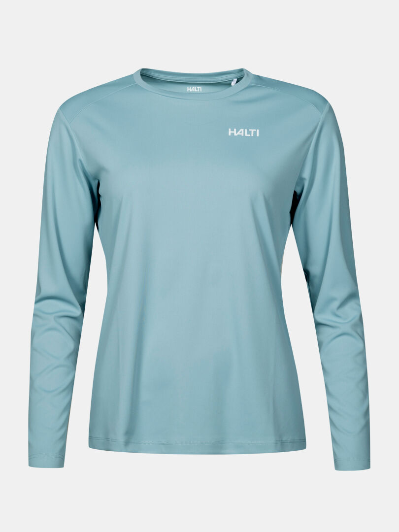 Halti Salves Treenipaita Naisten, vaaleansininen kauluspaita logolla, kuvassa yksivärisellä pohjalla.
