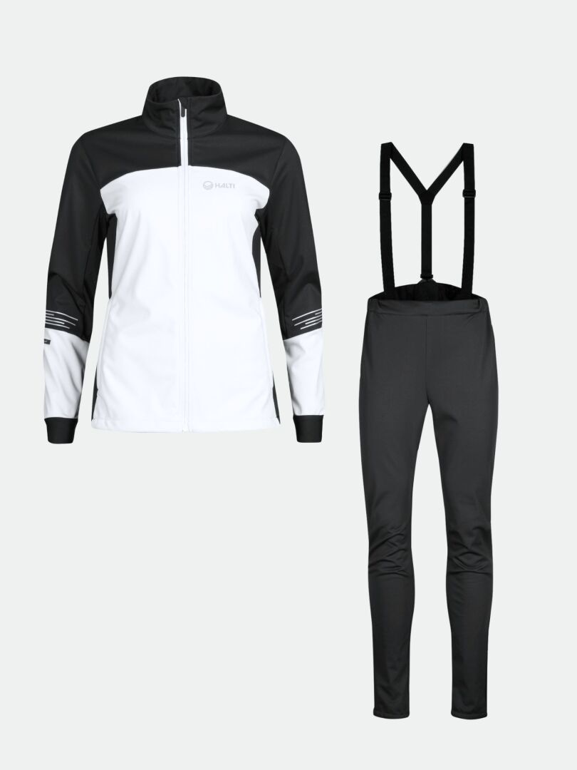 Halti Siide Hiihtopuku Naisten mustavalkoinen stretch-softshell-setti, jossa on henkselit yksivärisellä pohjalla.