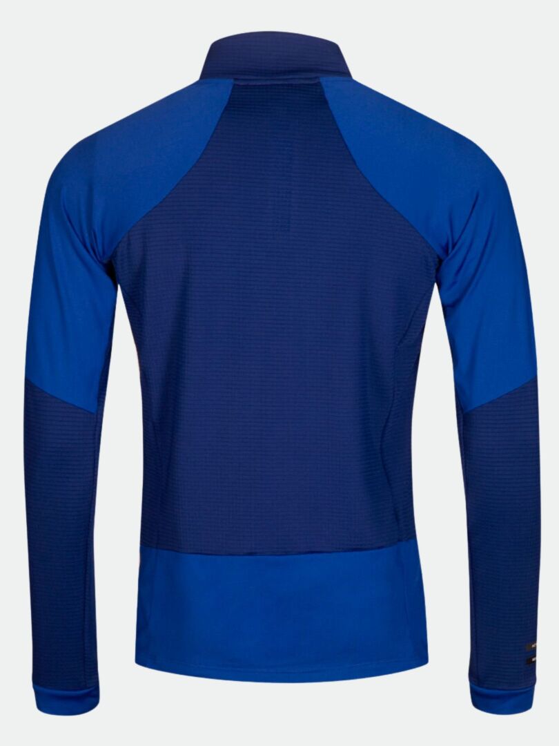 Halti HeatGrid Välitakki Miesten, pitkähihaisen kaksivärisen sinisen takin selkänäkymä näkyy vaalealla pohjalla.