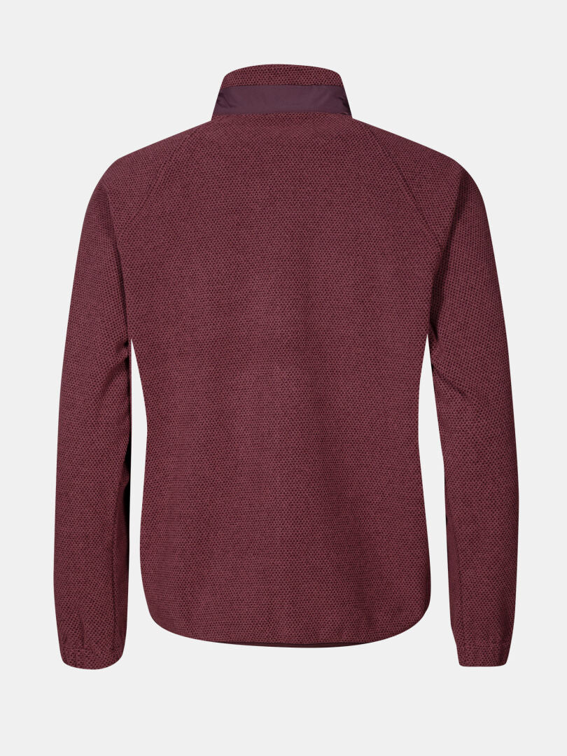 Halti Soolo Välitakki Naisten pitkähihaisen ruskeankeltaisen kauluspaidan selkänäkymä vaalealla pohjalla.